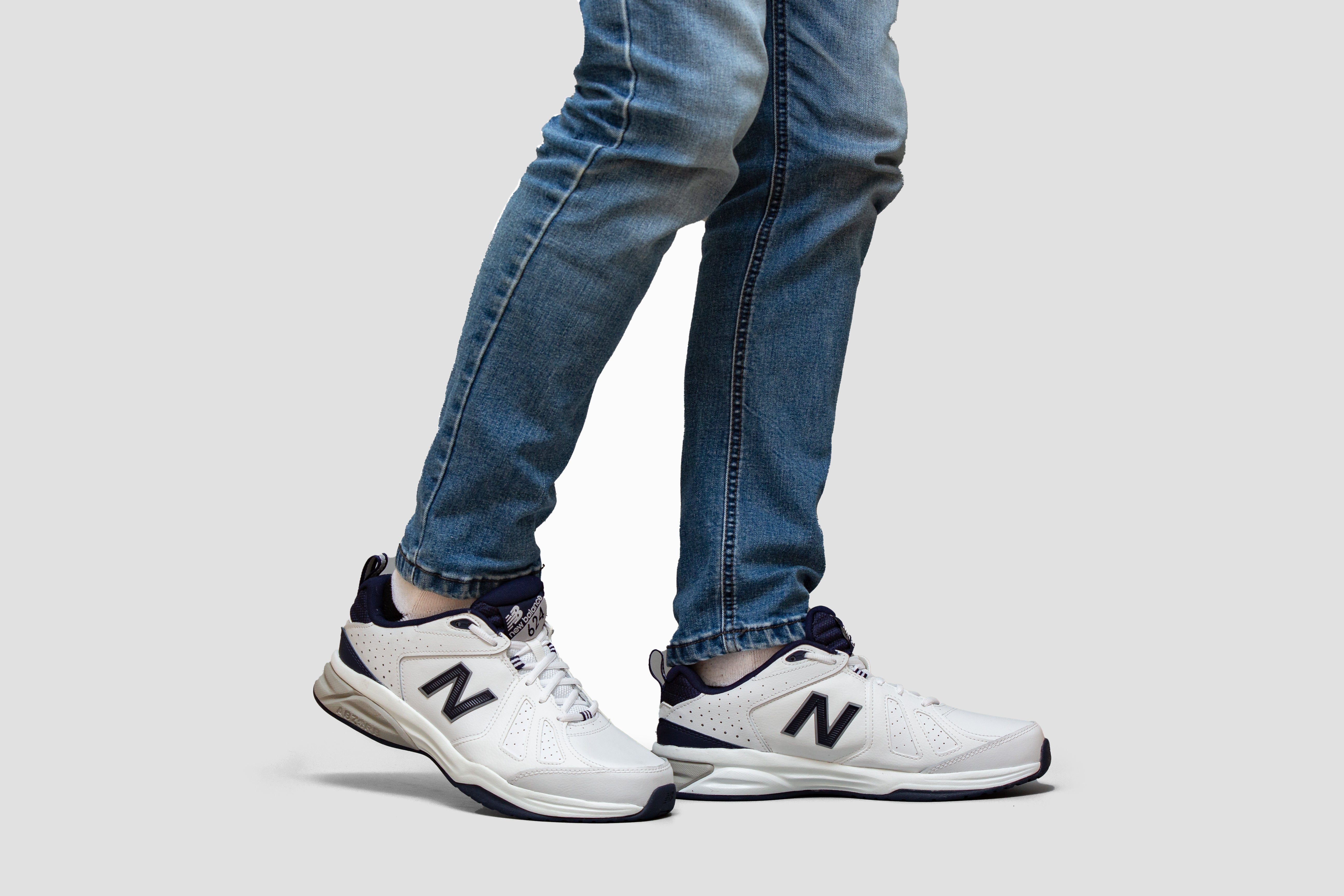 New balance gris hombre jeans best sale